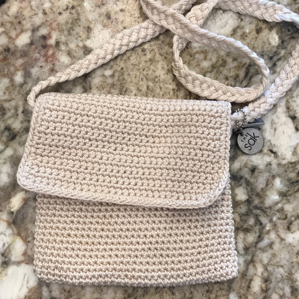 Small weaved purse by The Sak